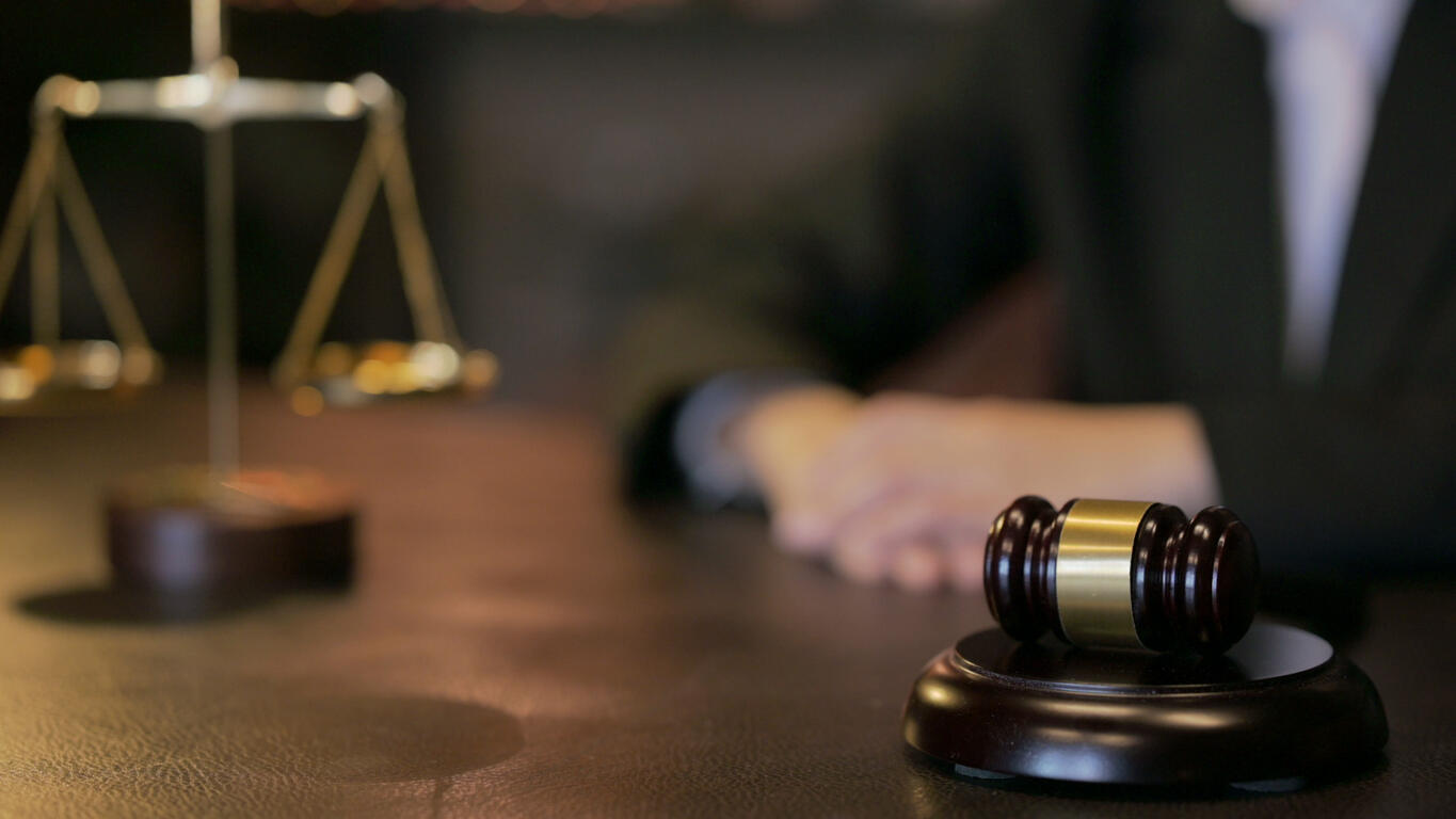 Truck Accident lawyer sitting and gavel on the table